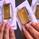 Harga Emas Antam Turun
